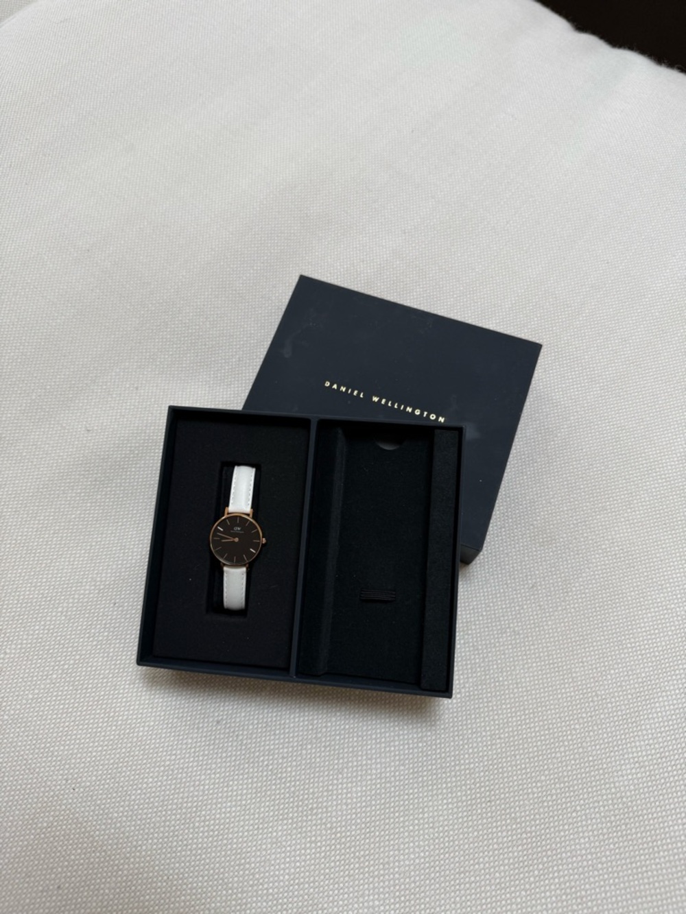 Daniel Wellington Black Dial Watch with Rose Gold Case and White leather Strap